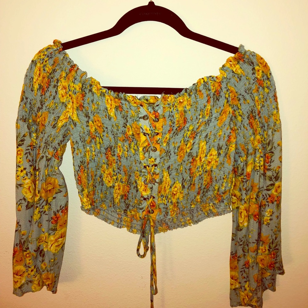 Beautiful floral top with loose arms